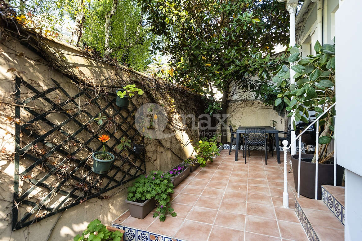 Maison à COURBEVOIE