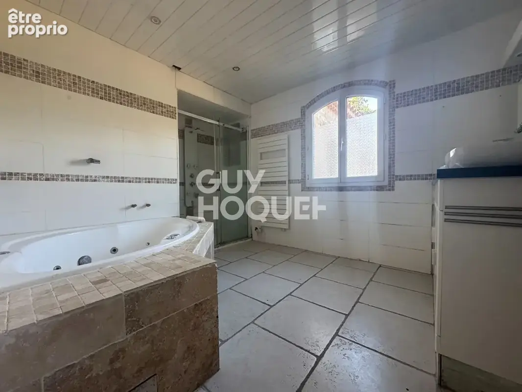Villa de 180m² avec appartement type 2 sur parcelle de 2200m² - photo 6