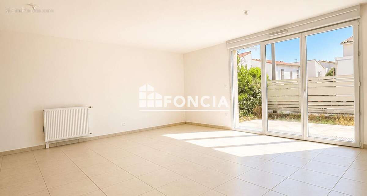 Maison 4 pieces en duplex avec deux parkings en sous-sol - photo 2