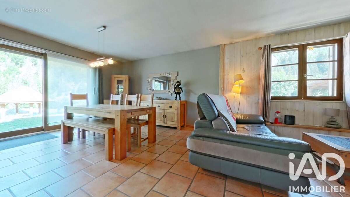 Maison 113 m² à Premanon  - photo 7