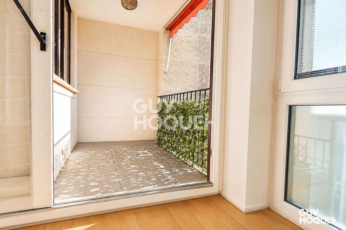 Appartement traversant de 85 m² + balcon - photo 6