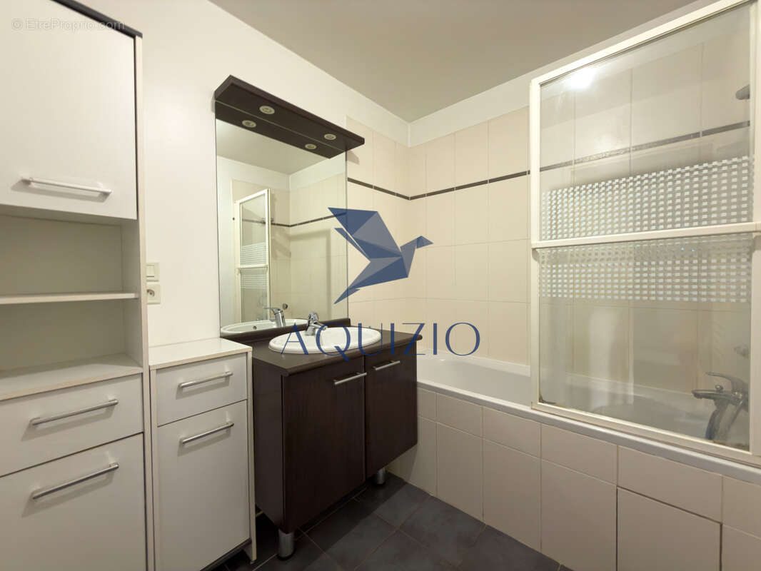 Appartement T3 en rez de jardin avec grande terrasse - photo 14