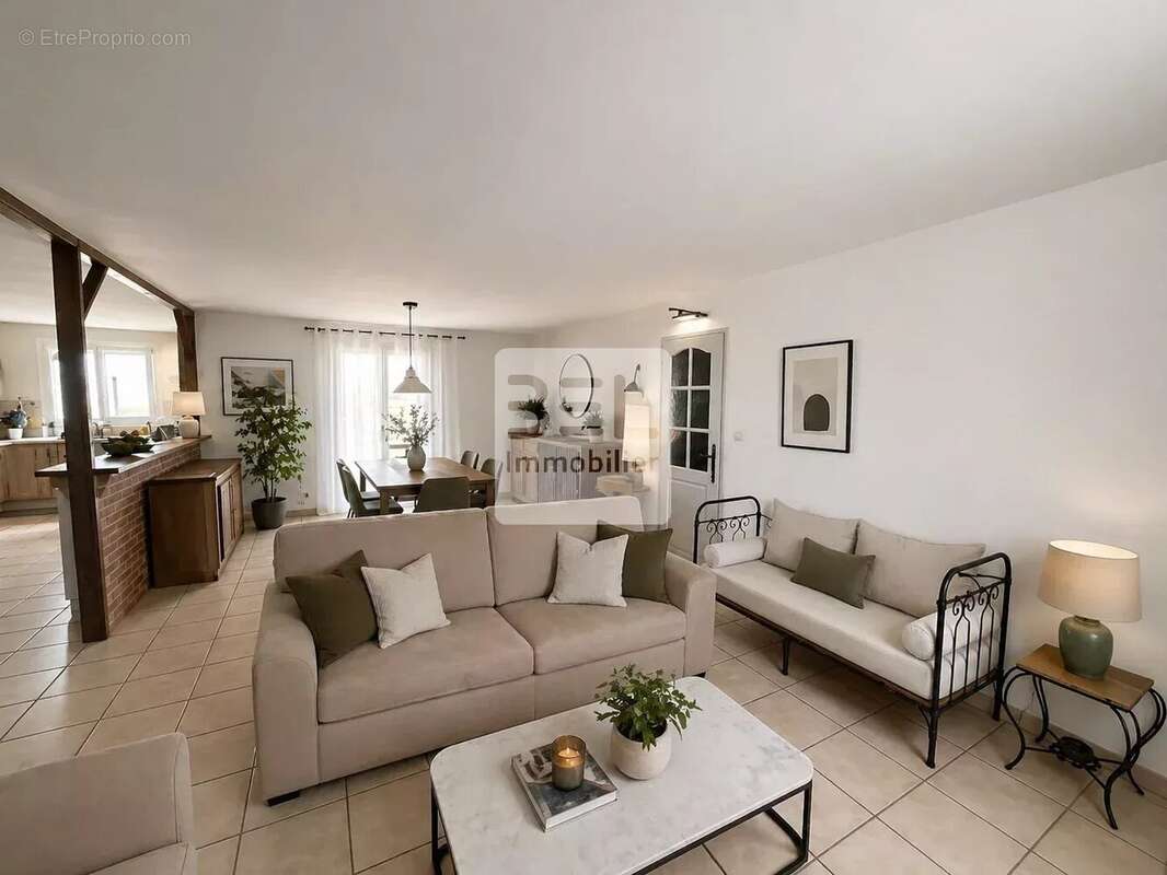 Maison à LAUDUN-L'ARDOISE