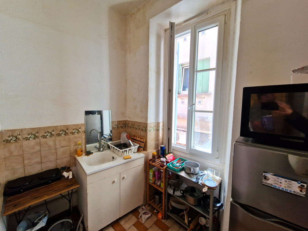 Immeuble locatif (2 studios et 1 T2) - photo 8