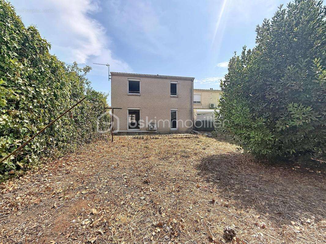 Maison 4 pièces de 89m2 avec garage - photo 2