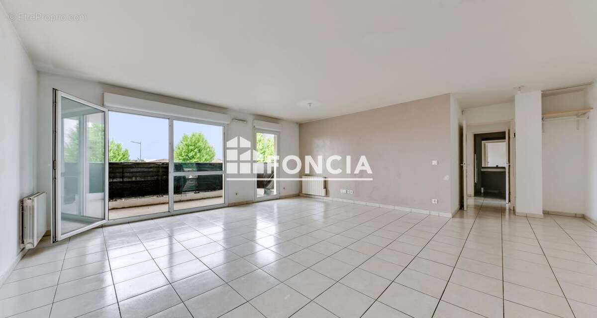 VAULX-EN-VELIN – T3 de 64 m² avec balcon et garage en résidence sécurisée de 2010 - photo 2