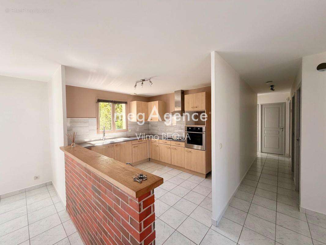 Maison de plain-pied 103 m² – 4 chambres – Garage – Terrain de 1 100 m² - photo 16