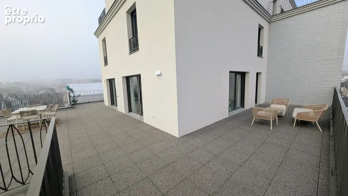 Appartement 113m2 - Terrasse exceptionnelle de 103m2 dominant Rennes Saint-Hélier - photo 8