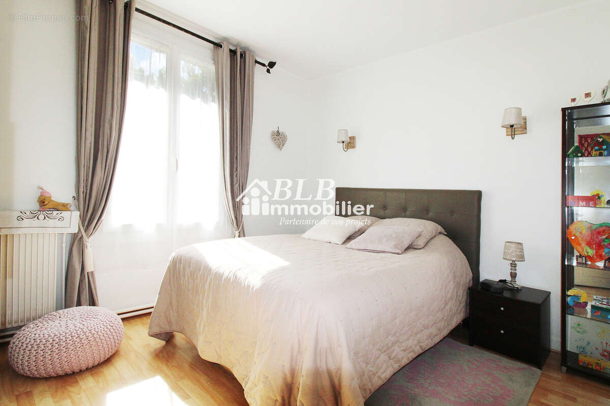 Maison de plain-pied 94m2  3 chambres + garage - photo 10