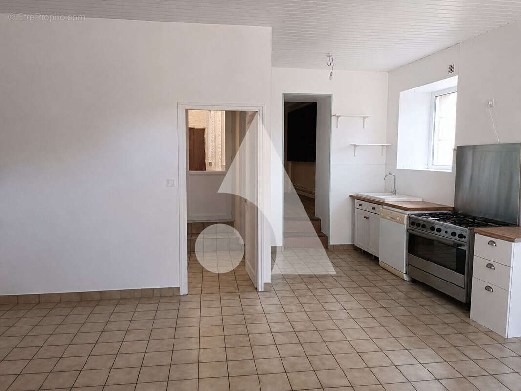 Maison de bourg en pierre avec jardin et dépendance - Plénée-Jugon 5 pièce(s) 120 m2 - photo 2