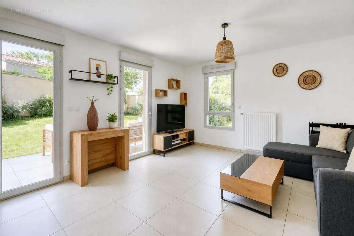 Appartement de 3 pièces de 66 m² à Sainte-Foy-lès-Lyon - photo 3