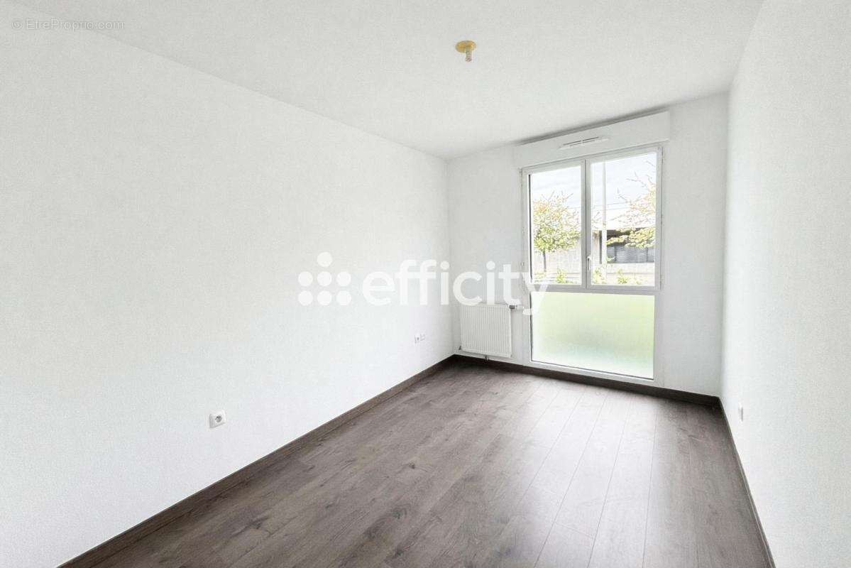 Appartement à BEAUZELLE