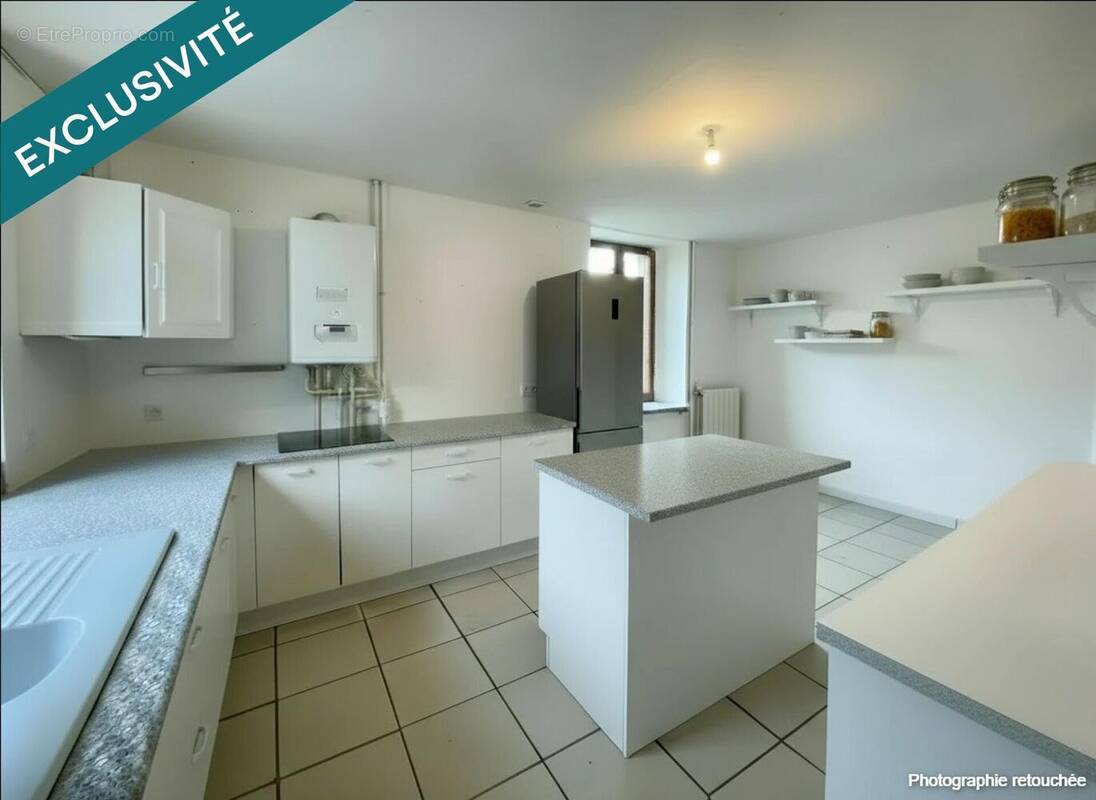 Photo 1 - Maison à SAINT-ETIENNE-DE-SAINT-GEOIRS