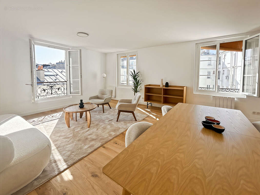 Appartement Paris 4 pièce(s) 91 m2 - photo 2
