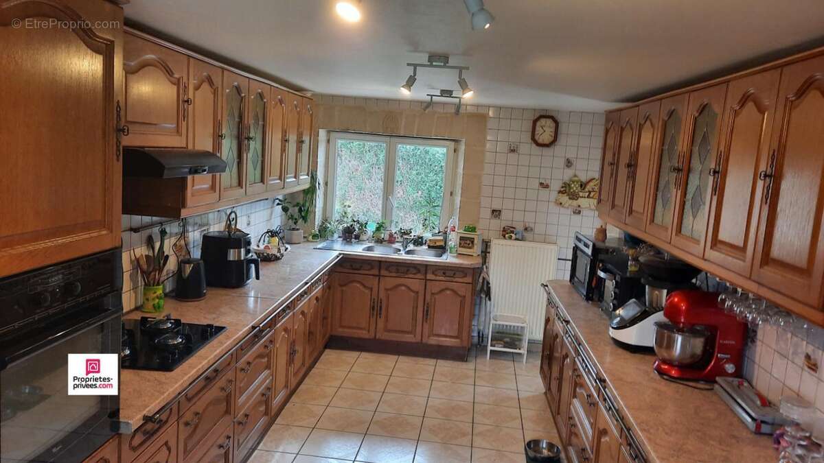 Maison à NEAUPHE-SOUS-ESSAI