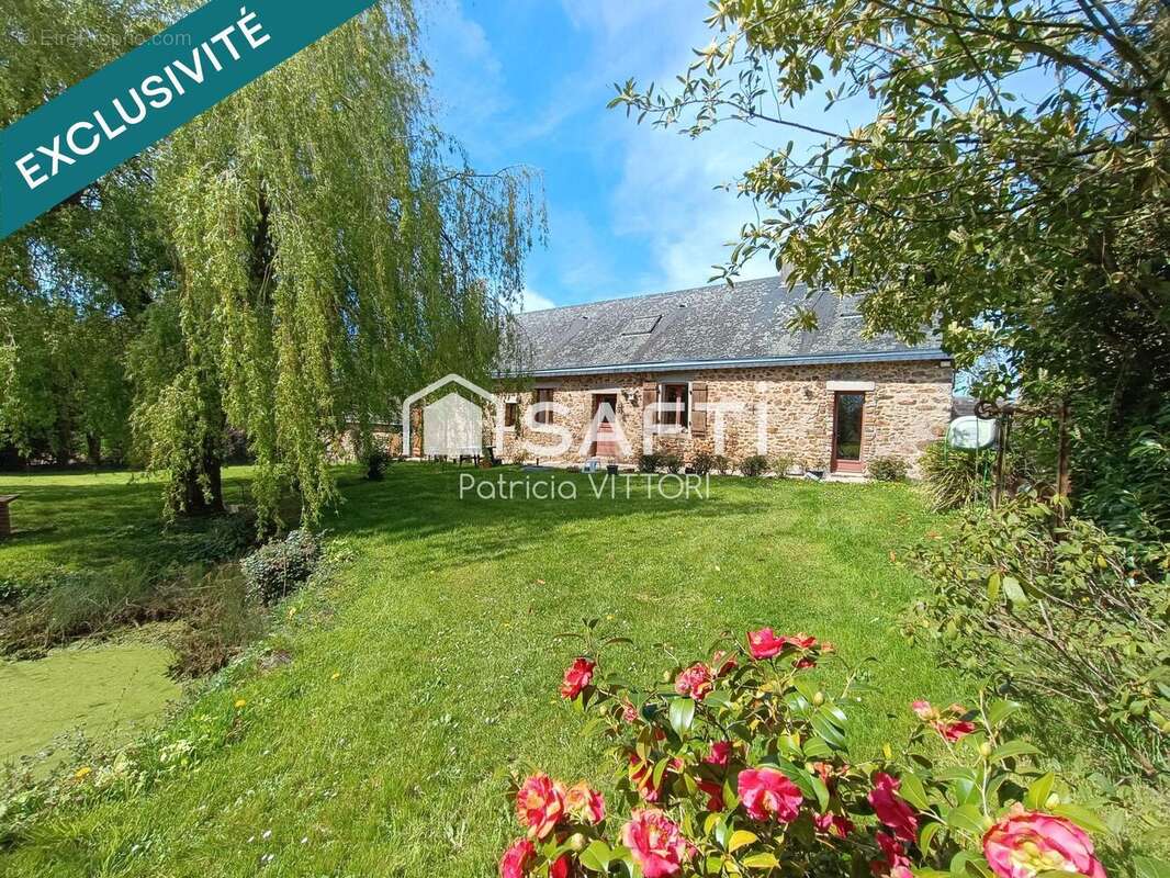 Photo 2 - Maison à LE BOURGNEUF-LA-FORET