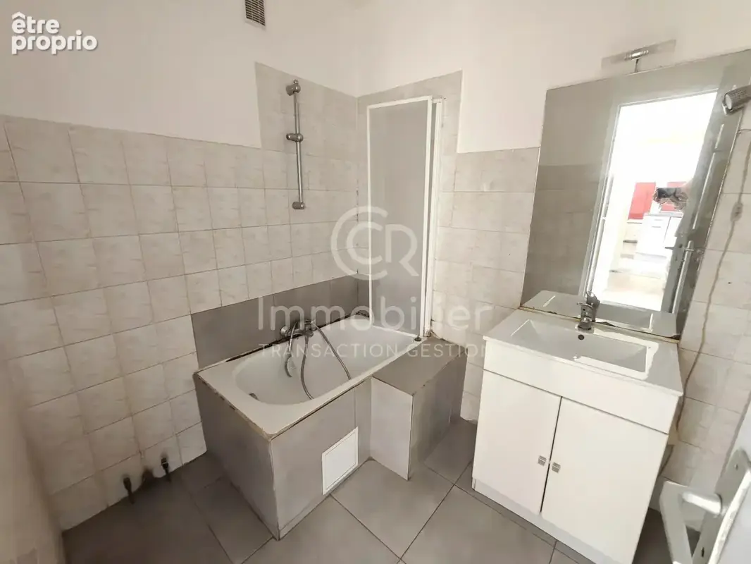 T3 traversant sud-nord 62m² rez-de-jardin - photo 11