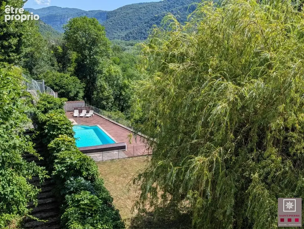 À 5 minutes du centre d' Ambérieu en Bugey. 2 maisons sur 9 000 M² de parc et bois. - photo 3