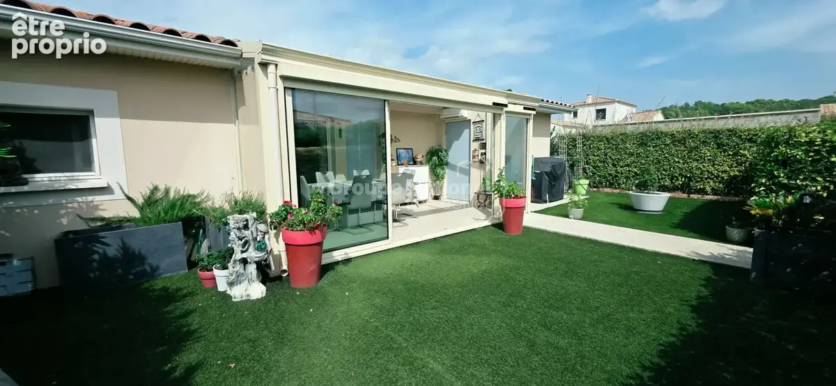 Appartement 2 chambres de 76.63m² avec jardinet  et garage - photo 2