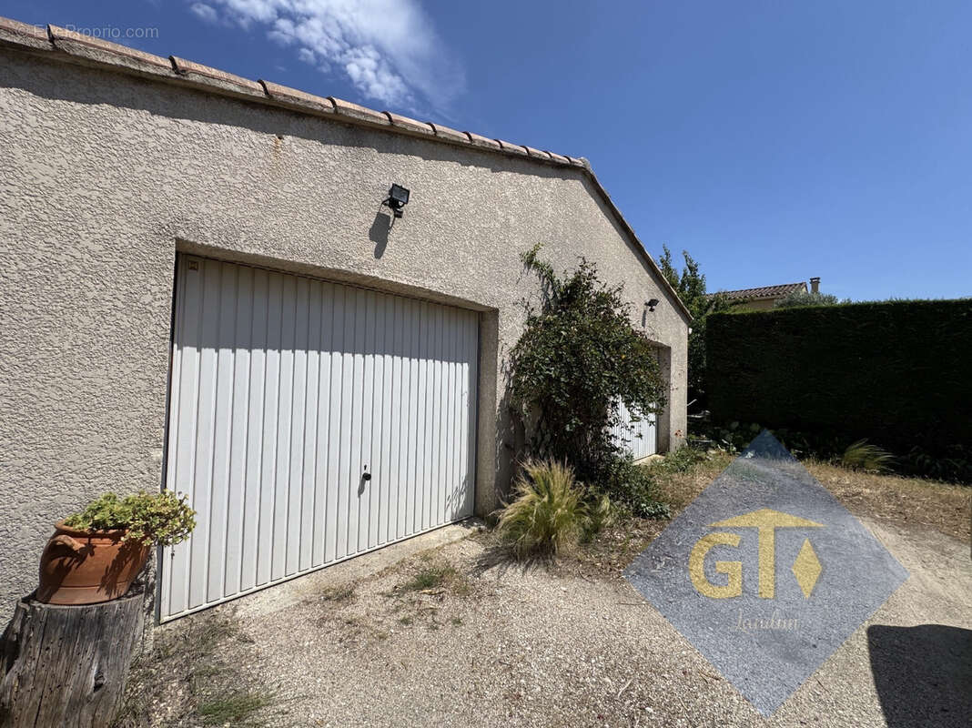 Maison à LAUDUN-L'ARDOISE