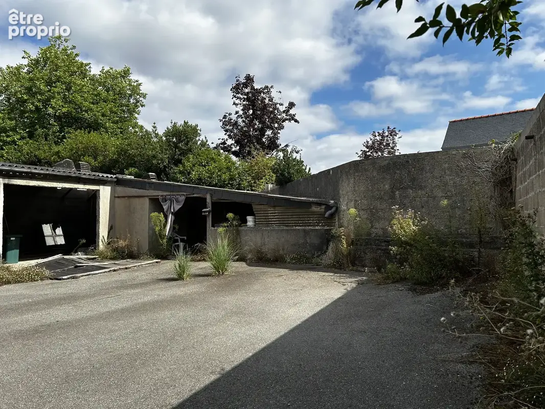 Maison avec 3 appartements et hangar - Proche du bourg - photo 10