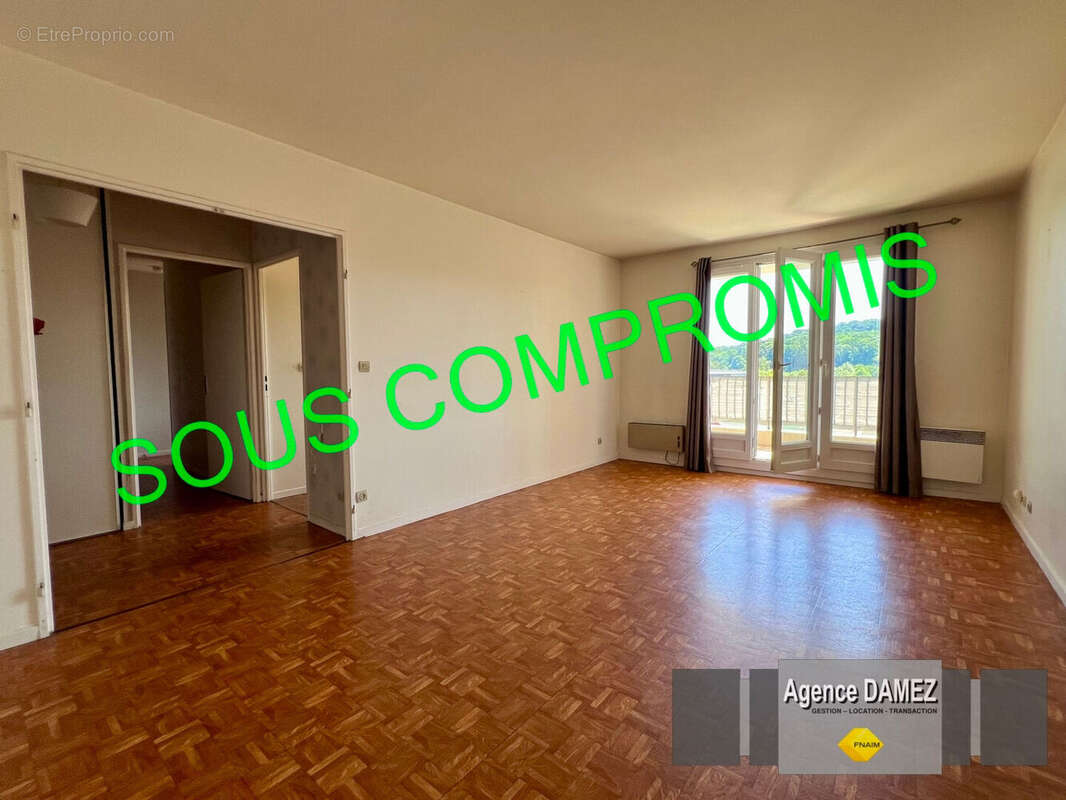 À vendre - Dourdan : Appartement T3 de 69 m² avec terrasse et garage - Proche commerces - photo 2