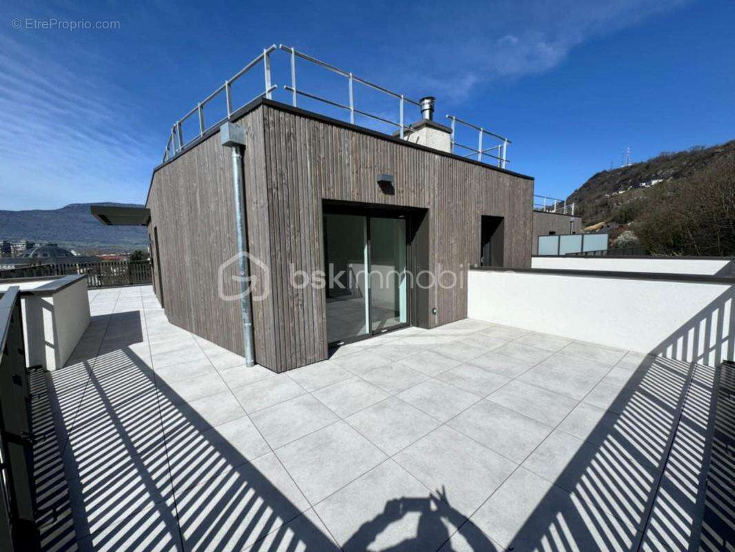 Au cœur de Chambéry – T4 en Rooftop de 94 m² - photo 4