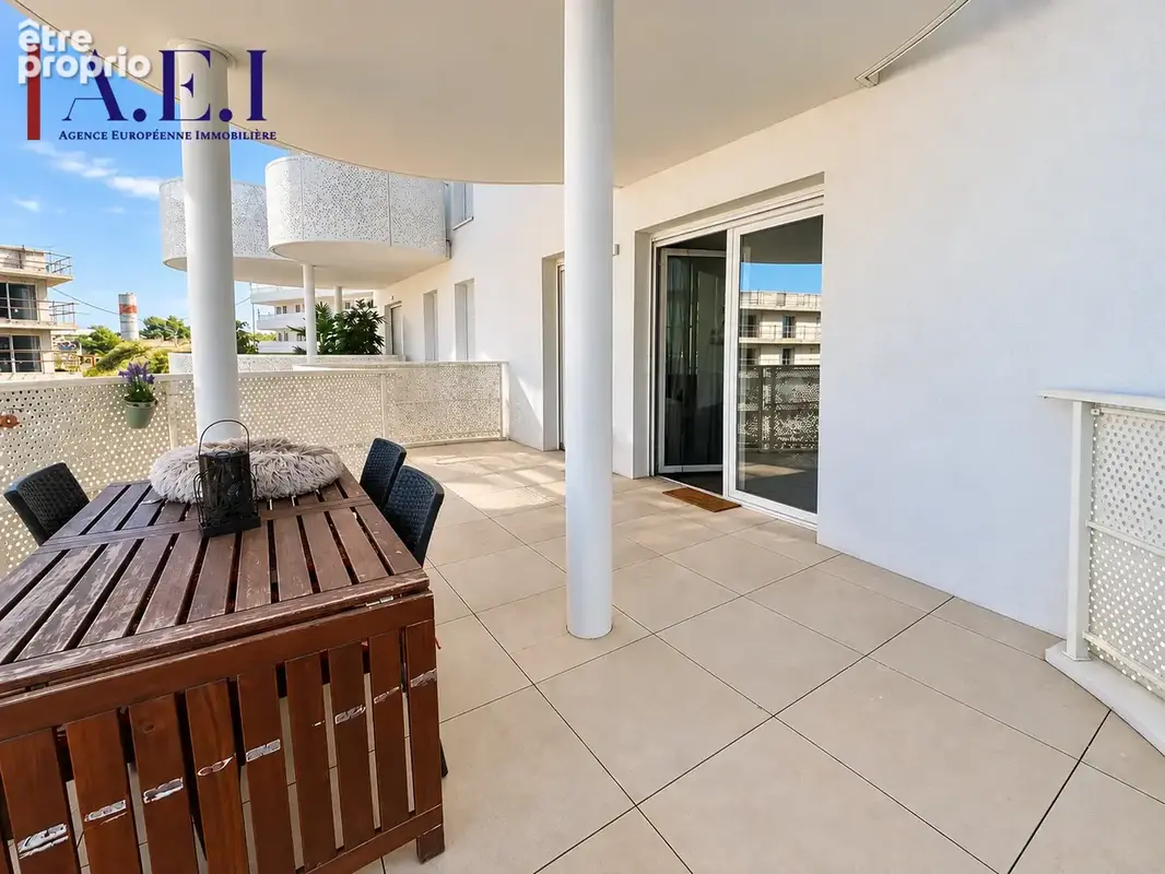 Appartement T3 avec terrasse et stationnement privatif - photo 2