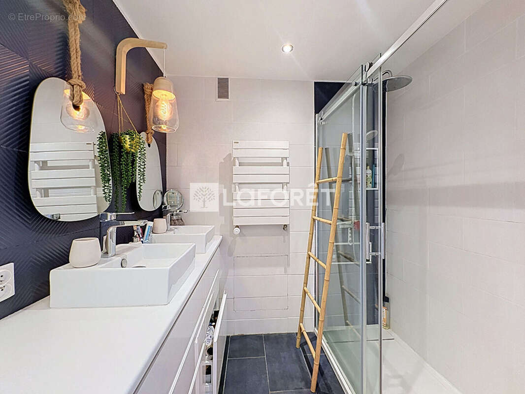 Appartement avec Jardin LE CLOS BARON 3 pièces - 76 M2. - photo 10