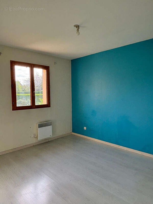 Maison traditionnelle de plain-pied, alliant confort et fonctionnalité - photo 4