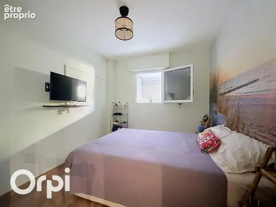 Appartement 2 pieces 35 m² + stationnement + cave + jardin + veranda 14 m² + piscine - photo 10