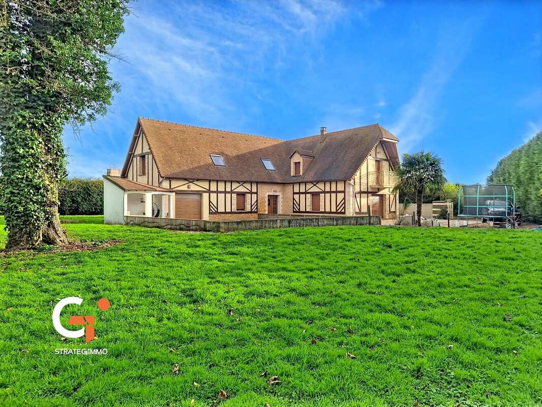 Maison à SAINT-OUEN-DE-THOUBERVILLE