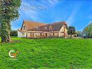 Maison à SAINT-OUEN-DE-THOUBERVILLE