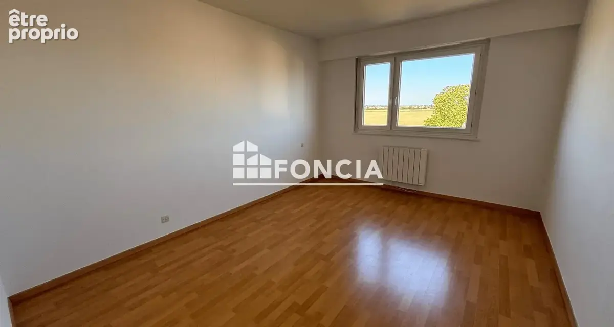 ERSTEIN Appartement traversant  88.33m2 avec vue dégagée, cave et garage - photo 5