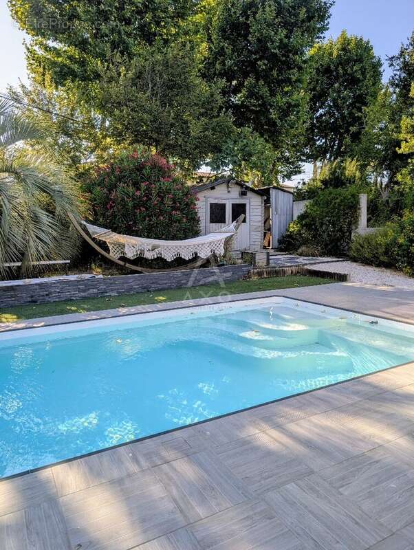 Maison de plain pied avec jardin,piscine et garage - photo 2