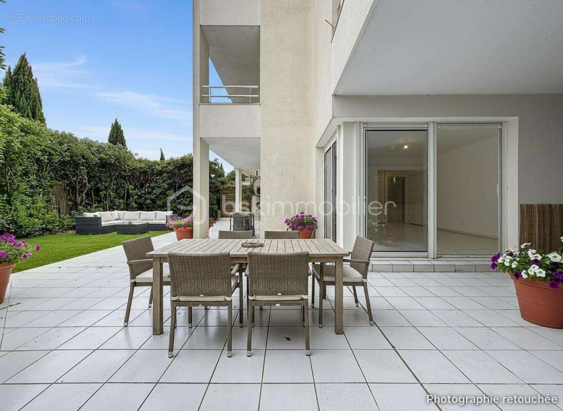 Appartement 2 pièces de 59 m2 avec jardin de 130 m2 + parking et cave - photo 7