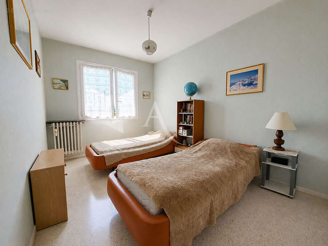 Appartement 4 pièces-Centre-ville- traversant- Parking s/s -cave - photo 10