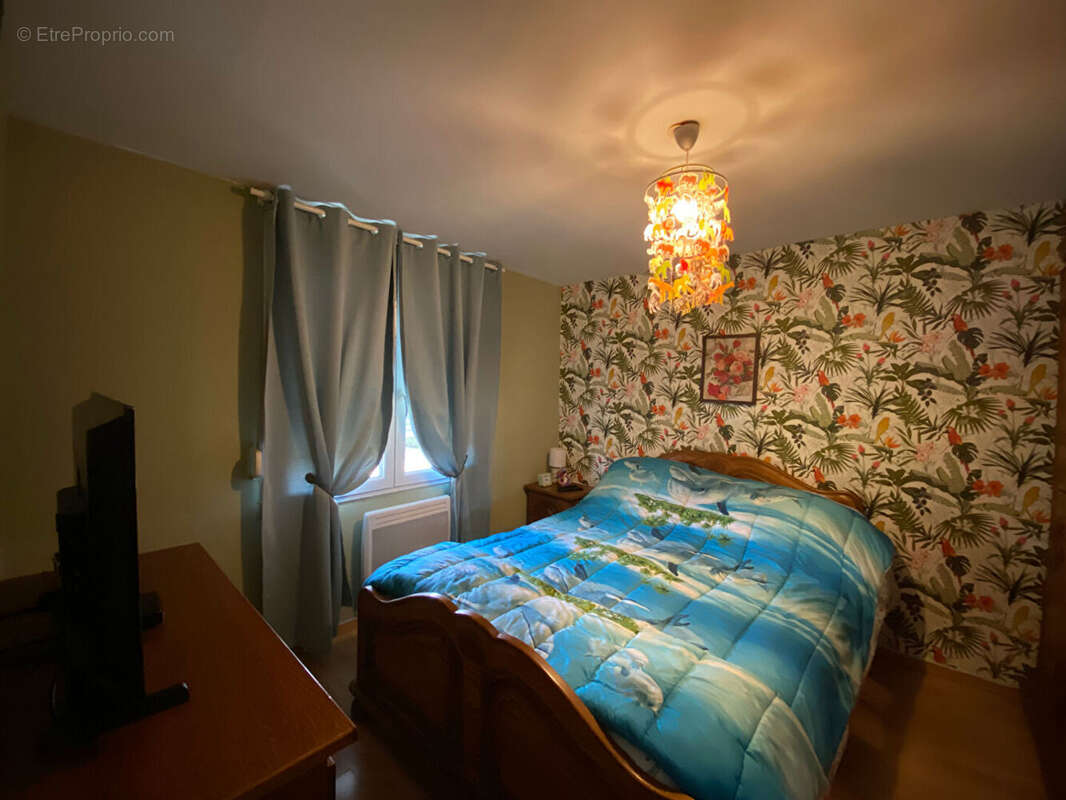 Ensemble immobilier composé de deux maisons louées - ATTIGNY - photo 12