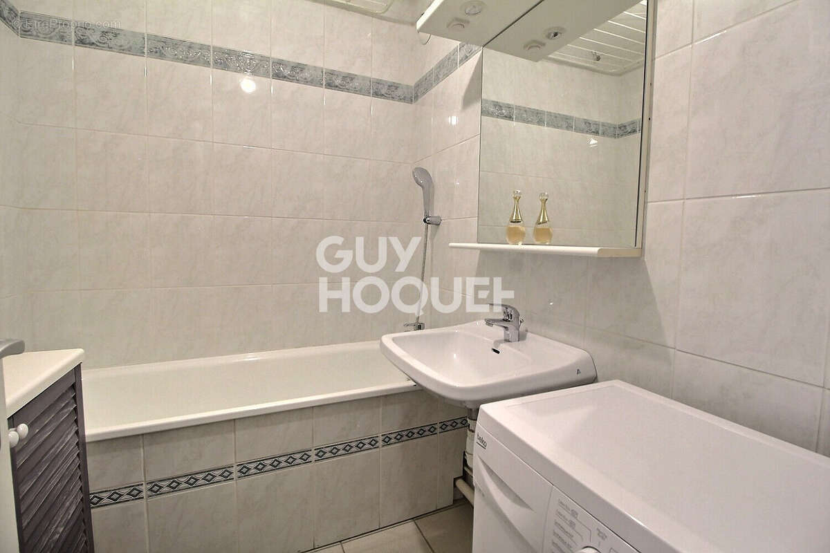 Appartement 4 pièces de 94 m² en rez-de-jardin - photo 10