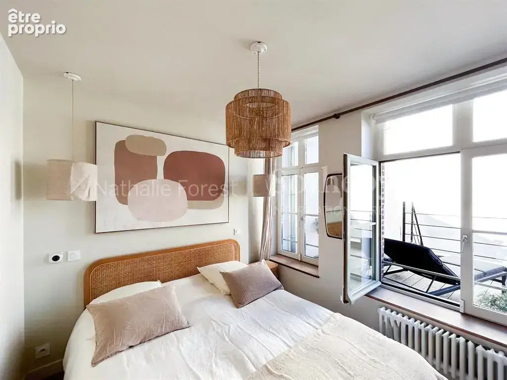 Superbe duplex rénové avec deux terrasses – Place des Archives - photo 12