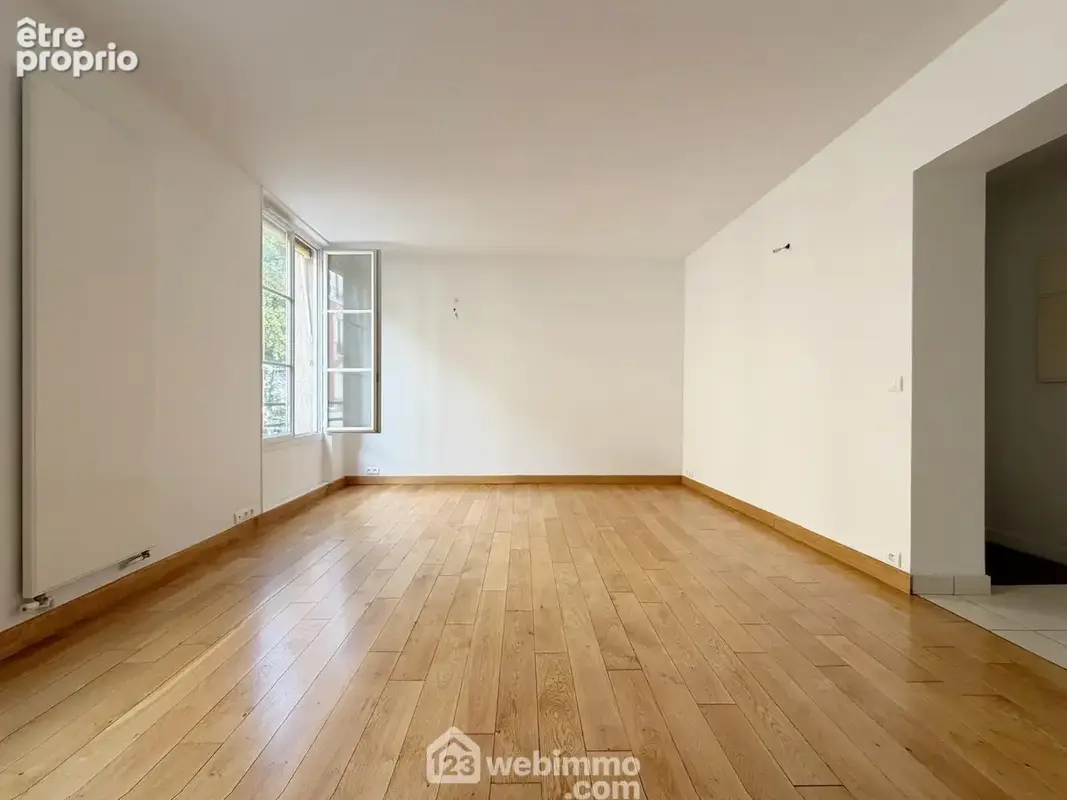 Séjour avec cuisine ouverte (30 m²) exposé sud