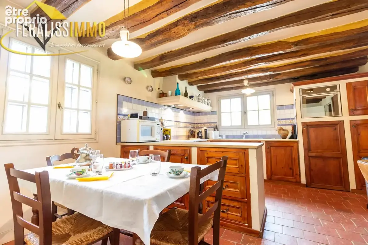 Dans un écrin de verdure, une chaleureuse maison vous atten - photo 5
