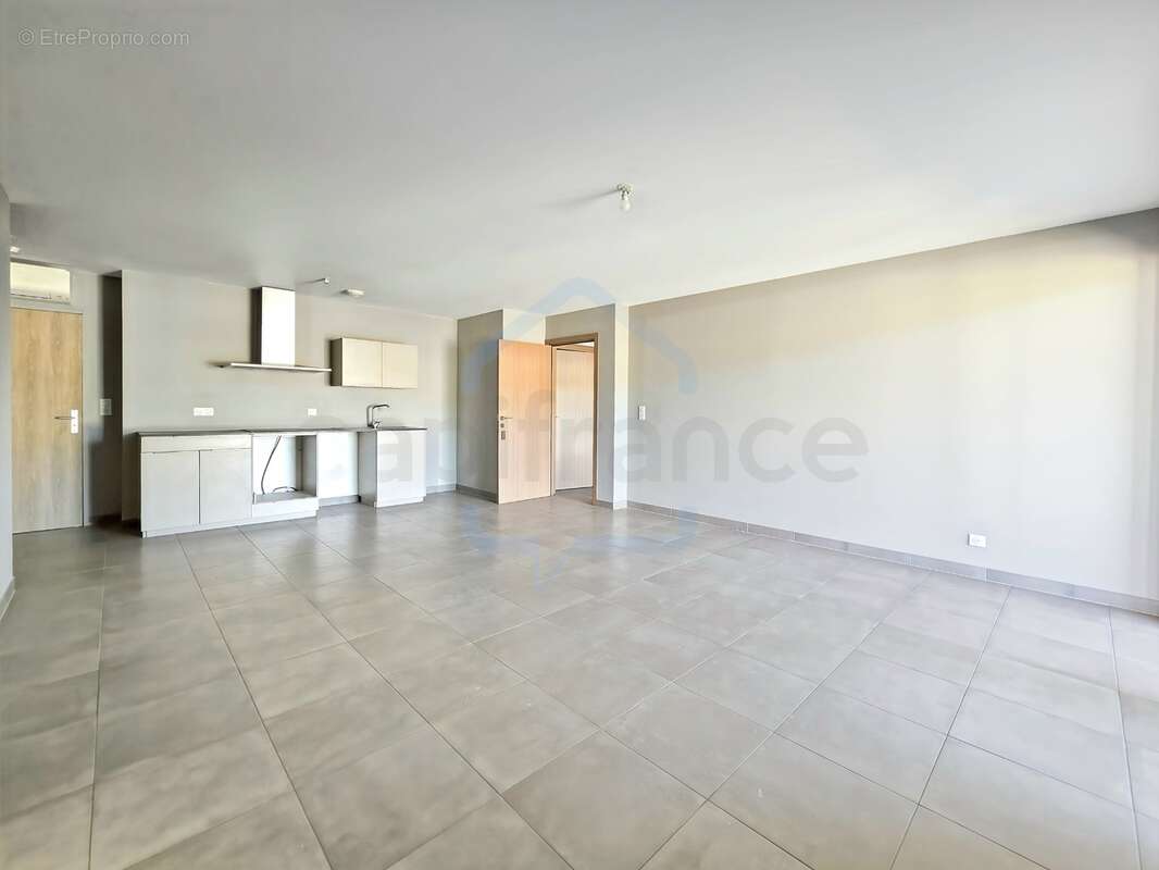 AJACCIO (20) ROCADE - T3 67 m² avec terrasse 18 m², ascenseur, parking sous-sol et vue dégagée - photo 6