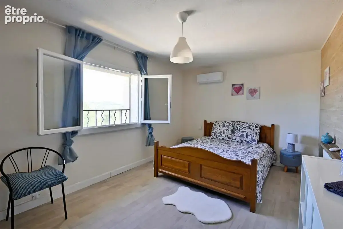 Maison de 5 pièces de 104 m² à Saint-Julien-les-Rosiers - photo 16