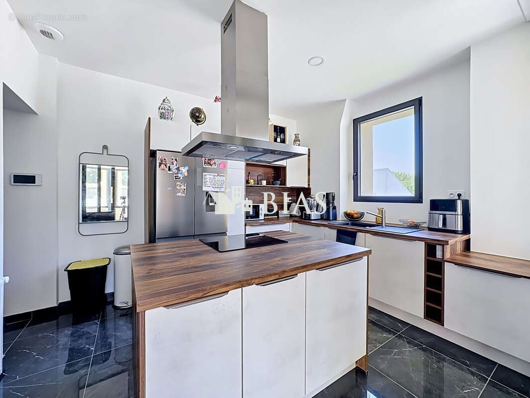 Maison 138 m² à Bourg-Achard  - photo 7