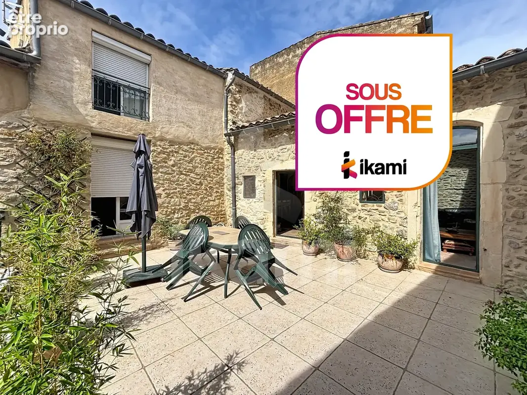 Maison à LAUDUN-L'ARDOISE