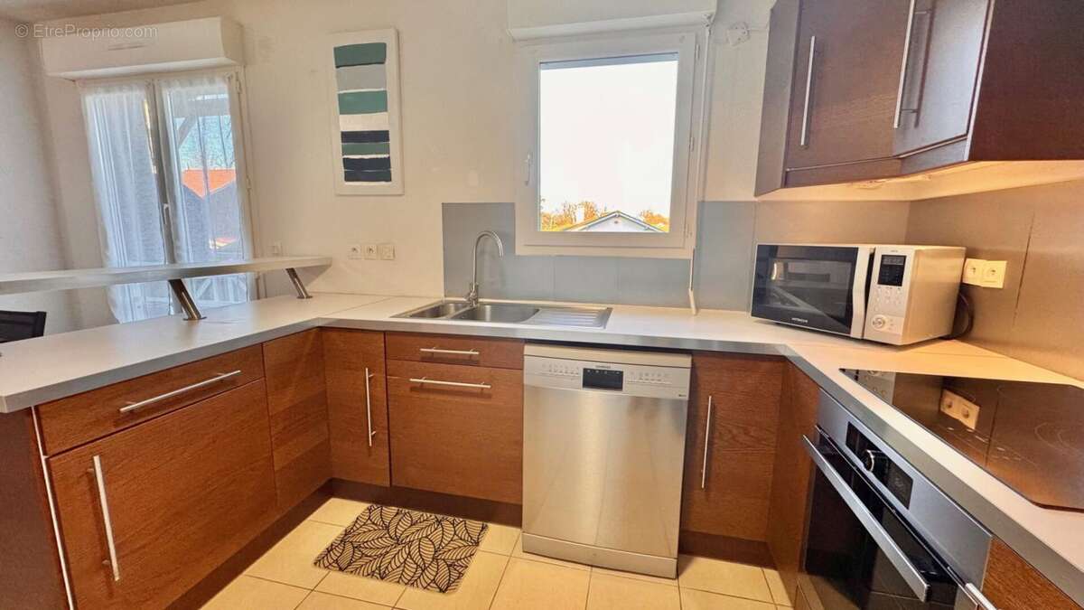 Tres beau t3 duplex avec 2 terrasses et garage ! - photo 4