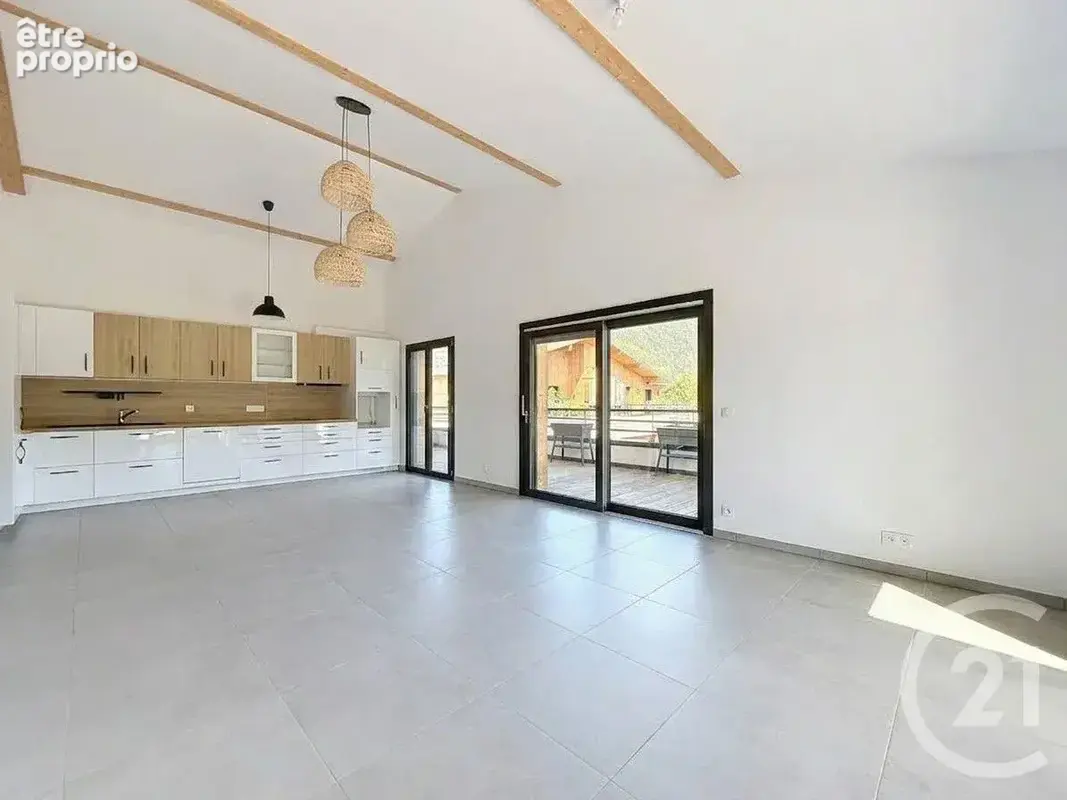 Appartement 5 pièces 105 m² à vendre à Taninges (74440) - photo 2