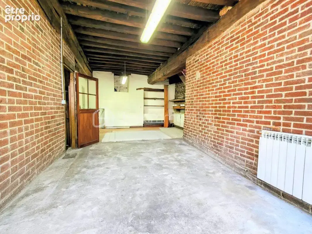 Ensemble immobilier (local commercial + appartement) plein centre ville - photo 11