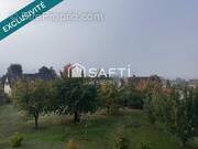 Photo 1 - Terrain à QUEVILLON